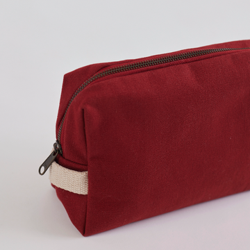 Side profile of the A Shok Vanity Bag from Dog D Originals with a focus on its chic contours.