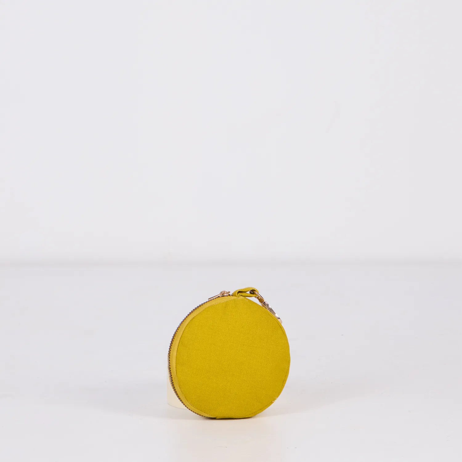 Crafted with cotton canvas, our mini coin pouches are available online