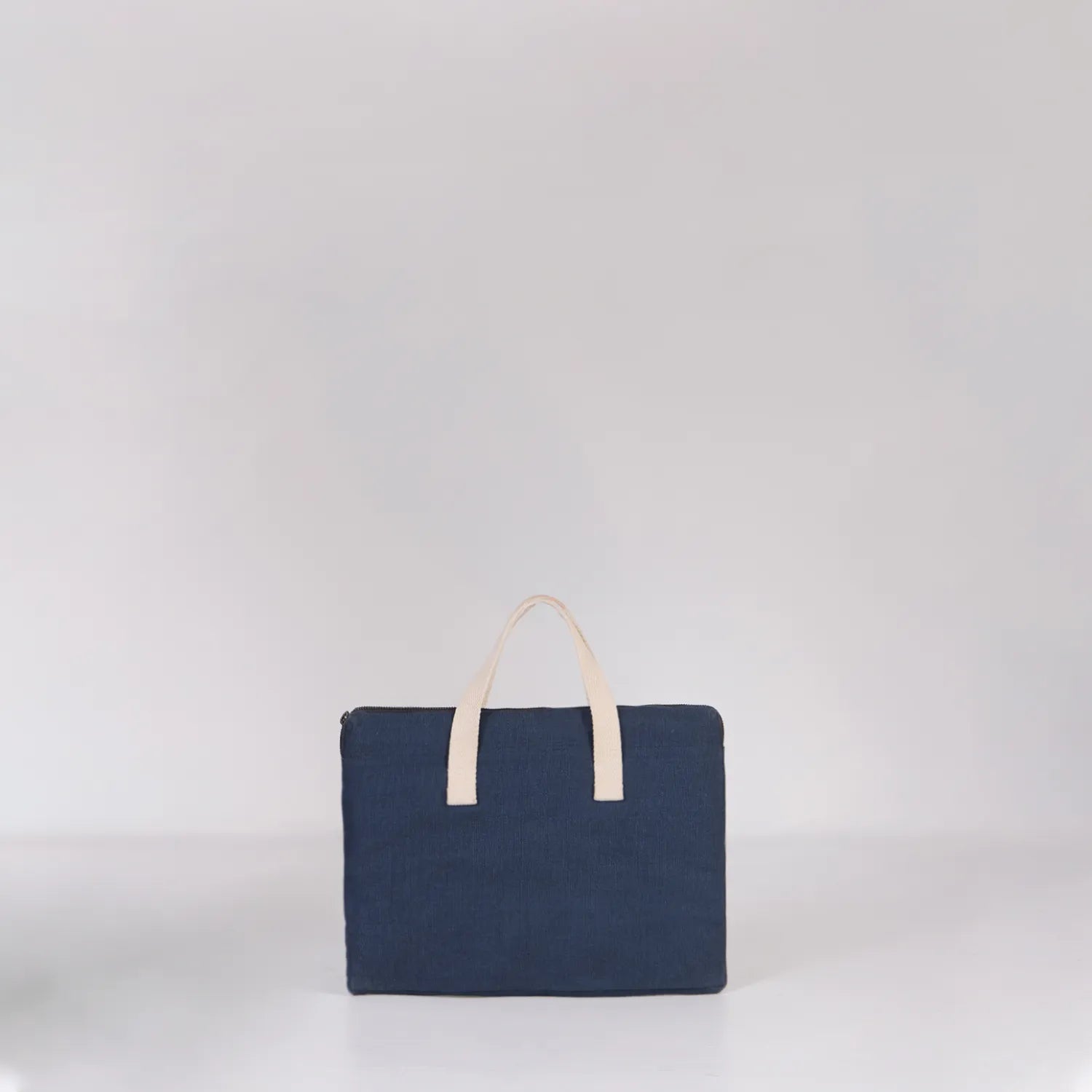 Protect from scratches, our black 14-inch laptop sleeve is available online