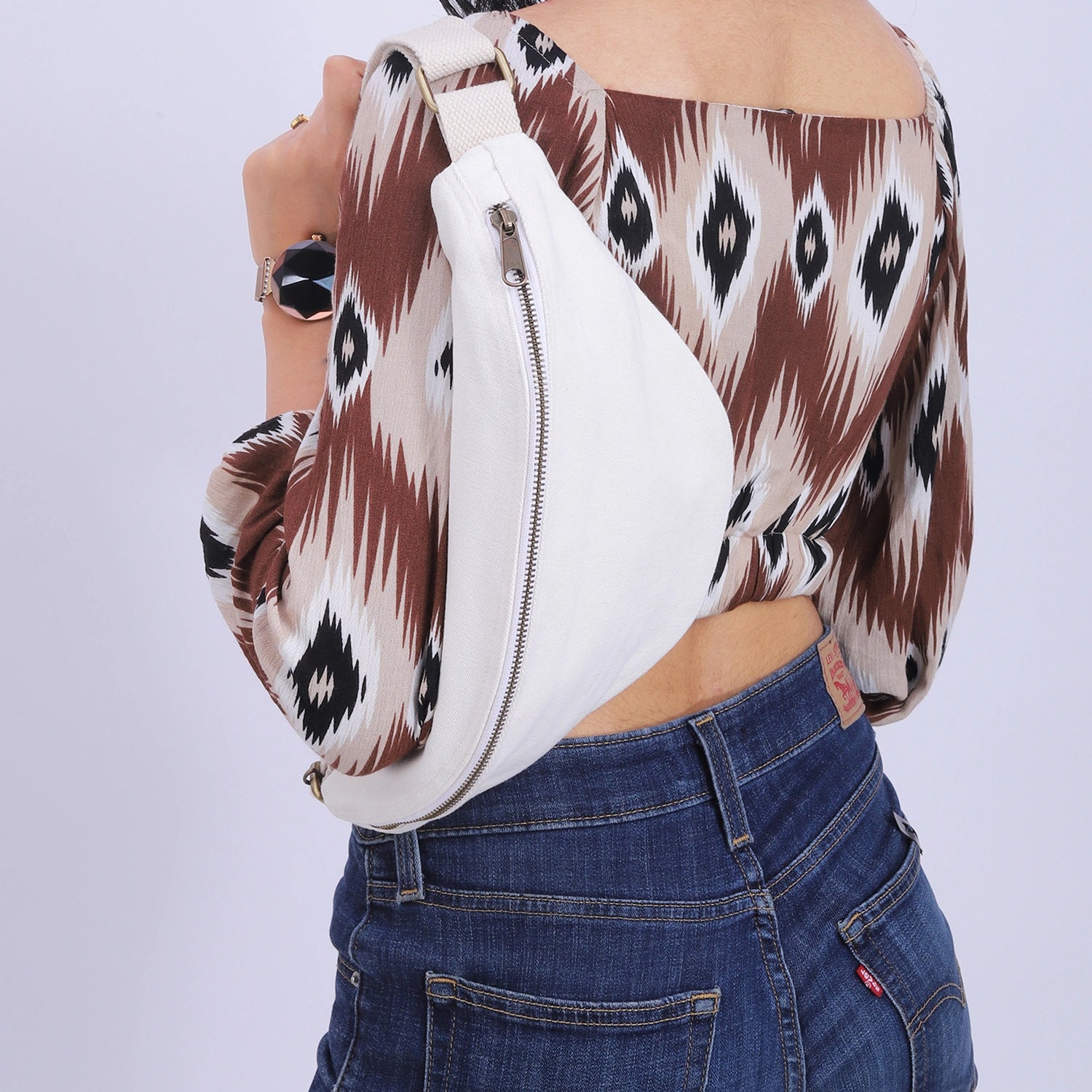 Eye-catching Safira Banana Bag in modern style