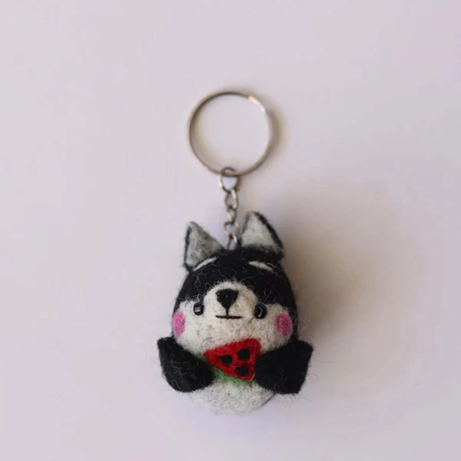 heart-melting expression, our dog keychain is available online