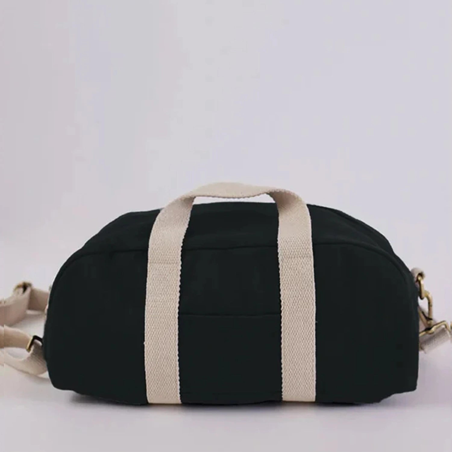 The Baba Bowler Bag Black Mini with modern detailing. Shop Now