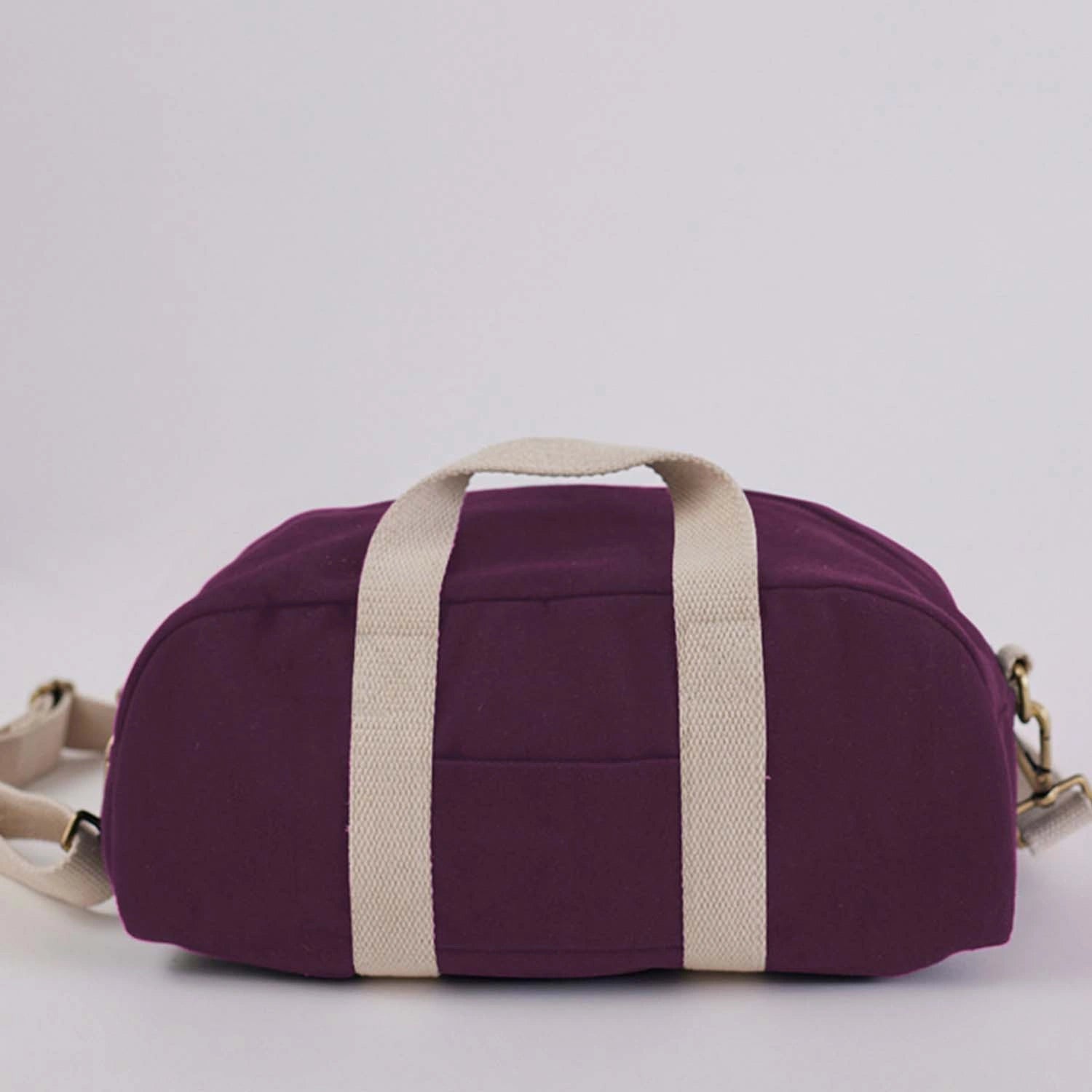 Explore our Mini Baba Bowler Burgundy Travel Bag, combining style and durability. Buy Now