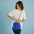 Ria Bucket Bag in a solid color with a drawstring closure for a secure and stylish look