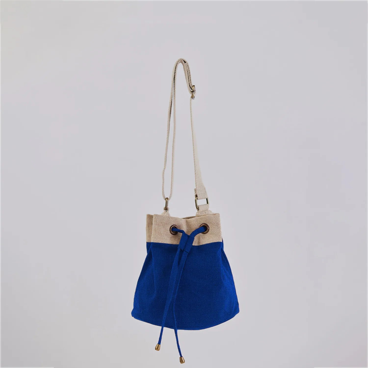 Elegant Ria Bucket Bag with a minimalist design perfect for both day and evening looks