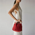 Ria Bucket Bag with cotton canvas material and a drawstring closure for easy access