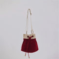 Ria Bucket Bag made with eco-friendly cotton canvas and featuring a comfortable crossbody strap