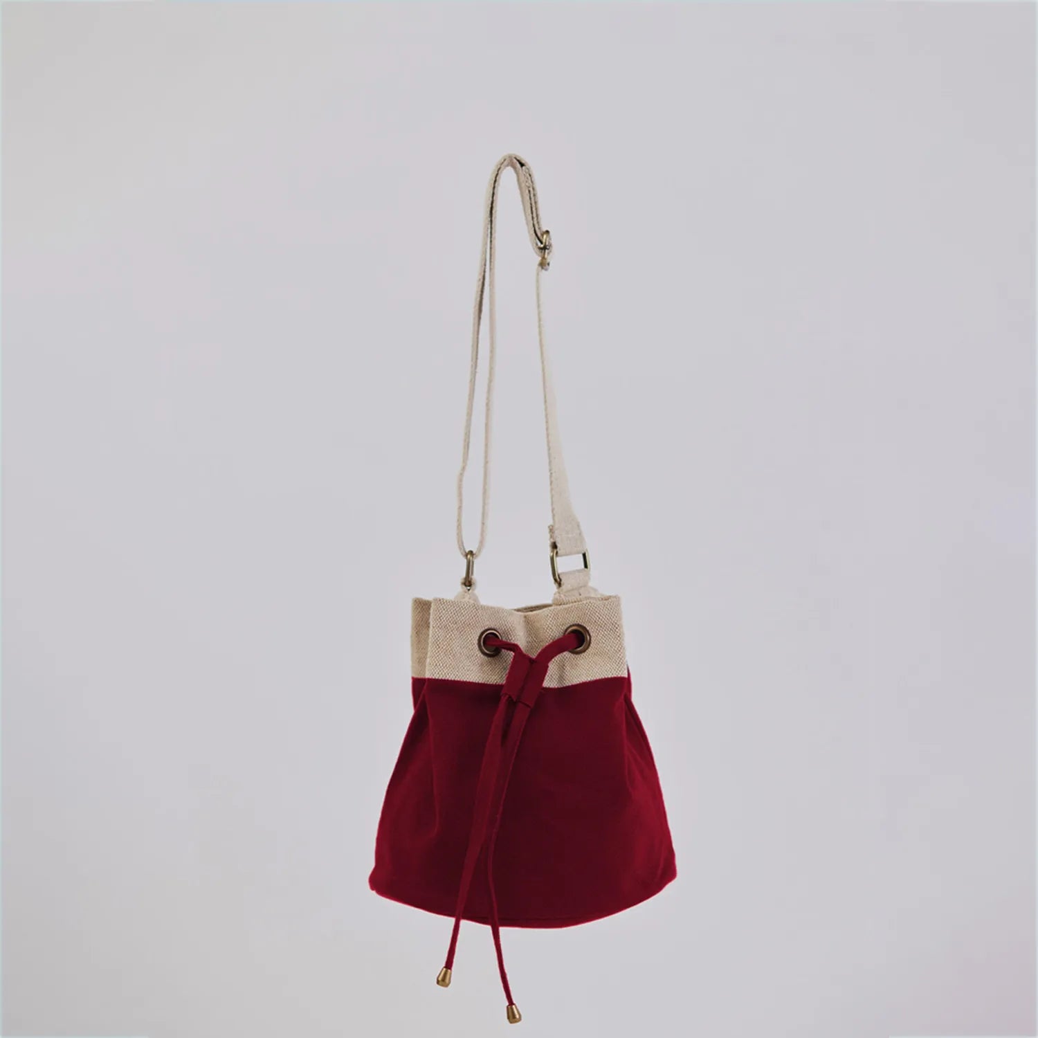 Ria Bucket Bag made with eco-friendly cotton canvas and featuring a comfortable crossbody strap