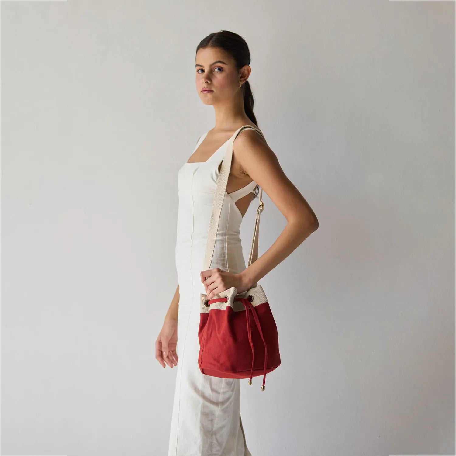 Stylish Ria Bucket Bag with traditional Indian print lining and adjustable metal hardware