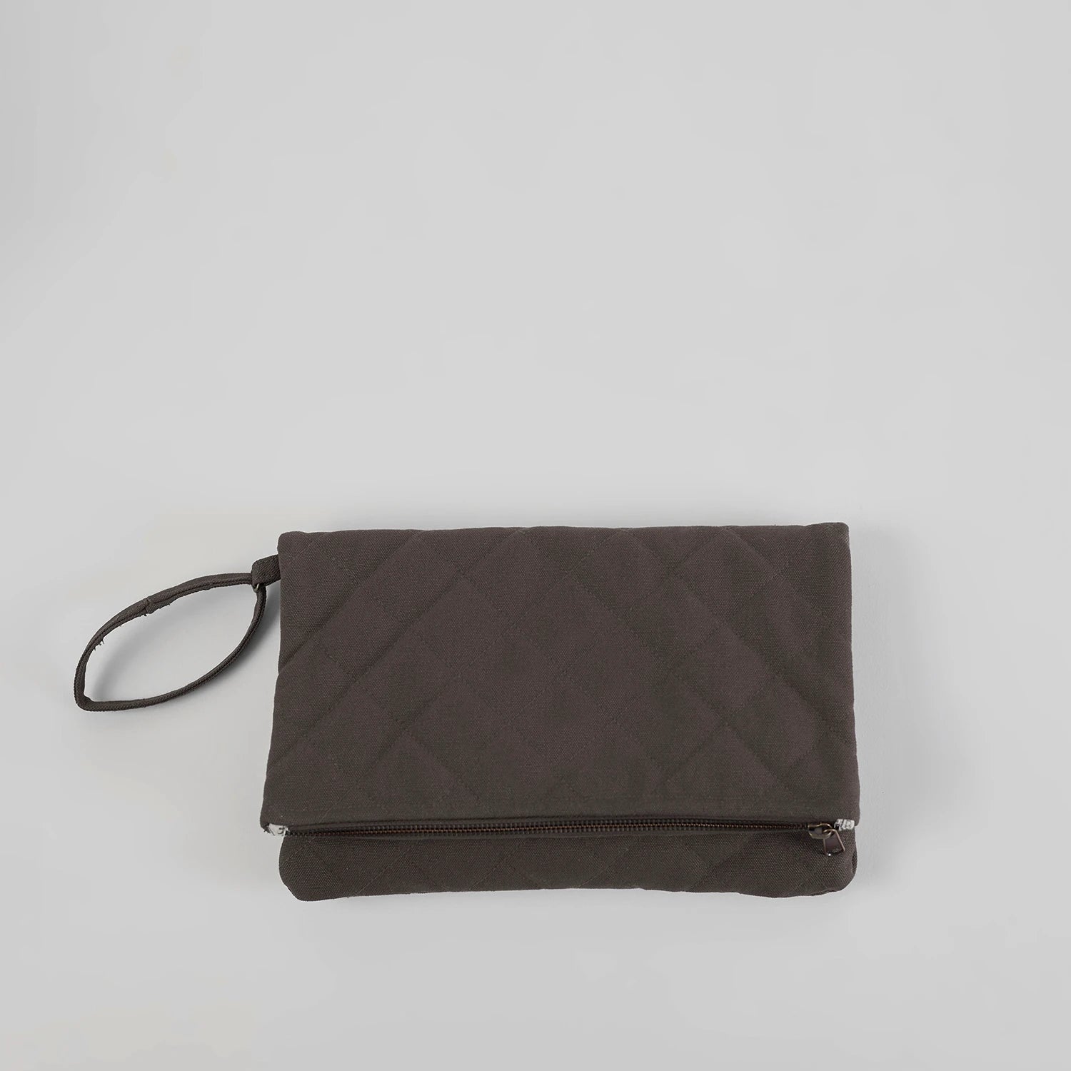 Our Dark Denim Krista Foldable Quilted Clutch Bag, designed to fold easily