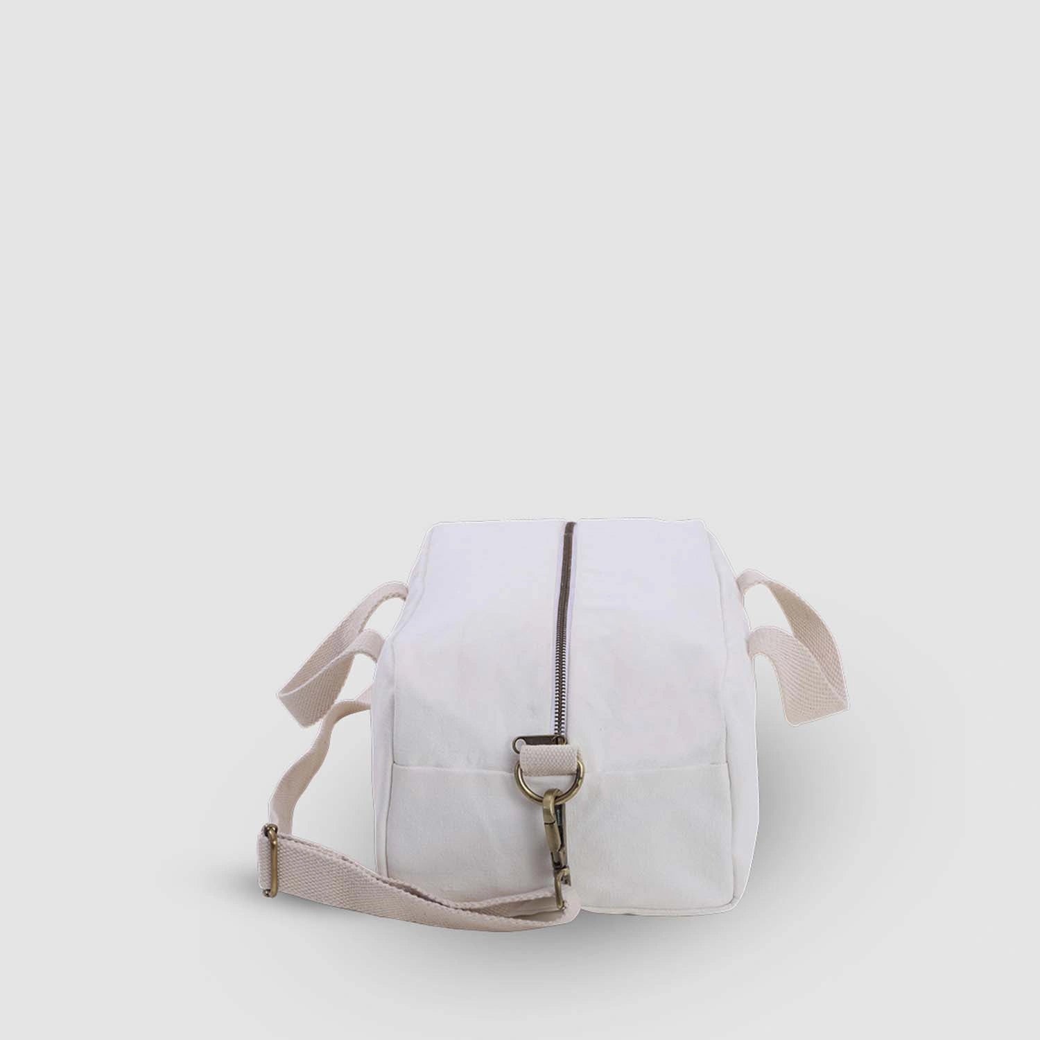 Ivory Mini Baba Bowler Travel Bag in a durable, high-quality cotton canvas. Shop Now