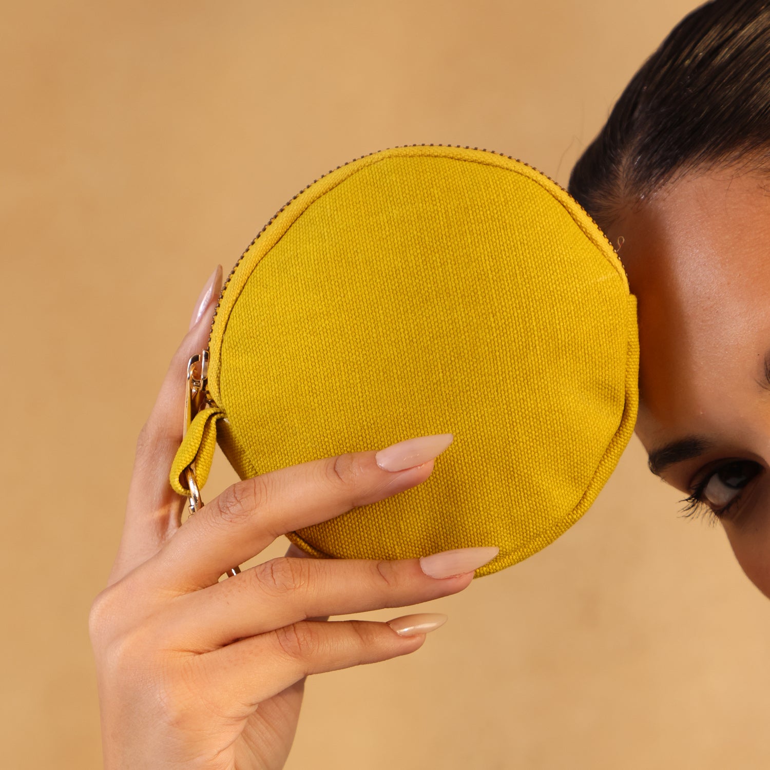 Perfect blend of charm, our Mini Pouch Bag in Mustard Yellow
