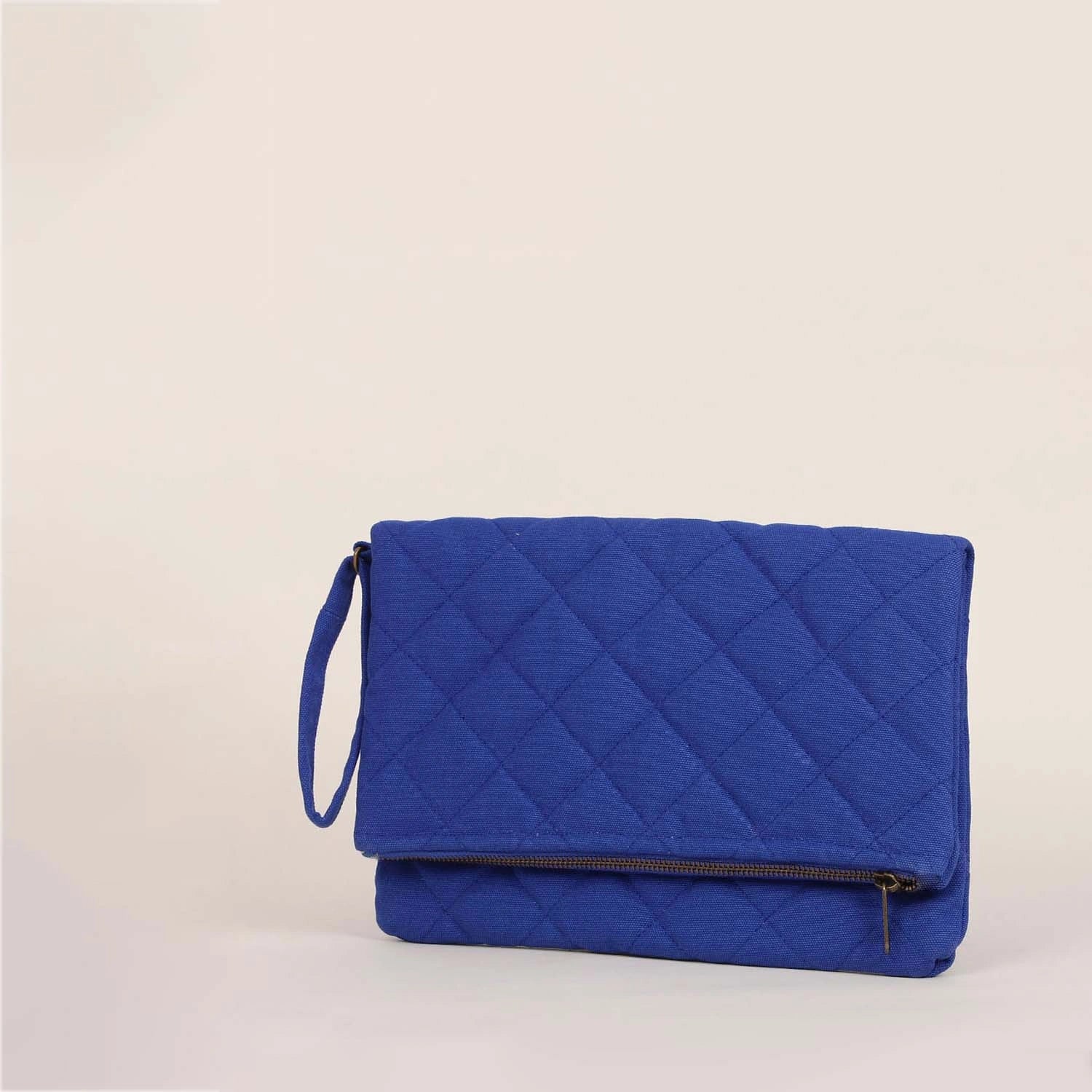 For daily use, check out our Krista foldable quilted sage green clutch purse