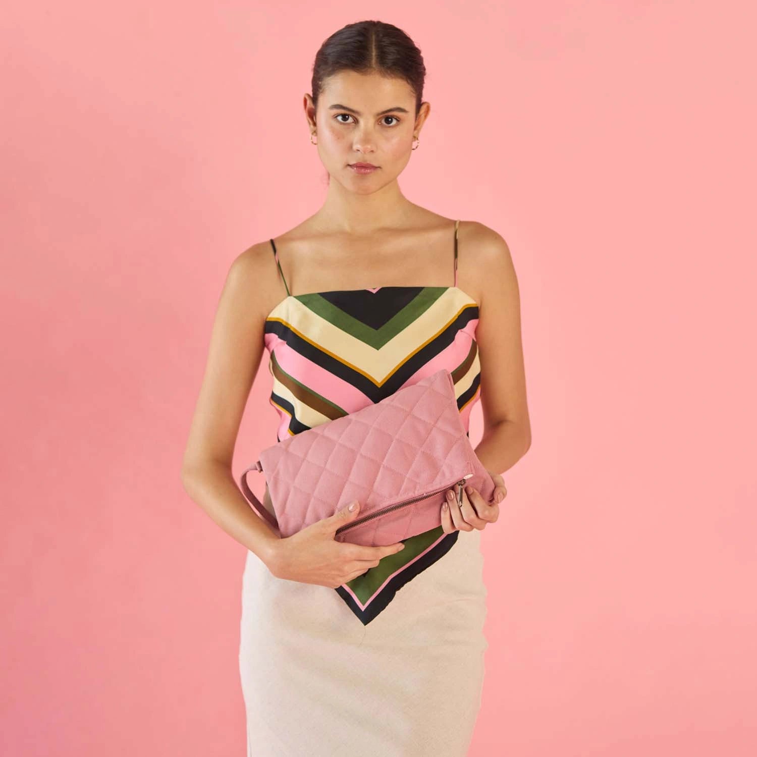 Make your outfit shine with our Krista Foldable Quilted Branded Clutches