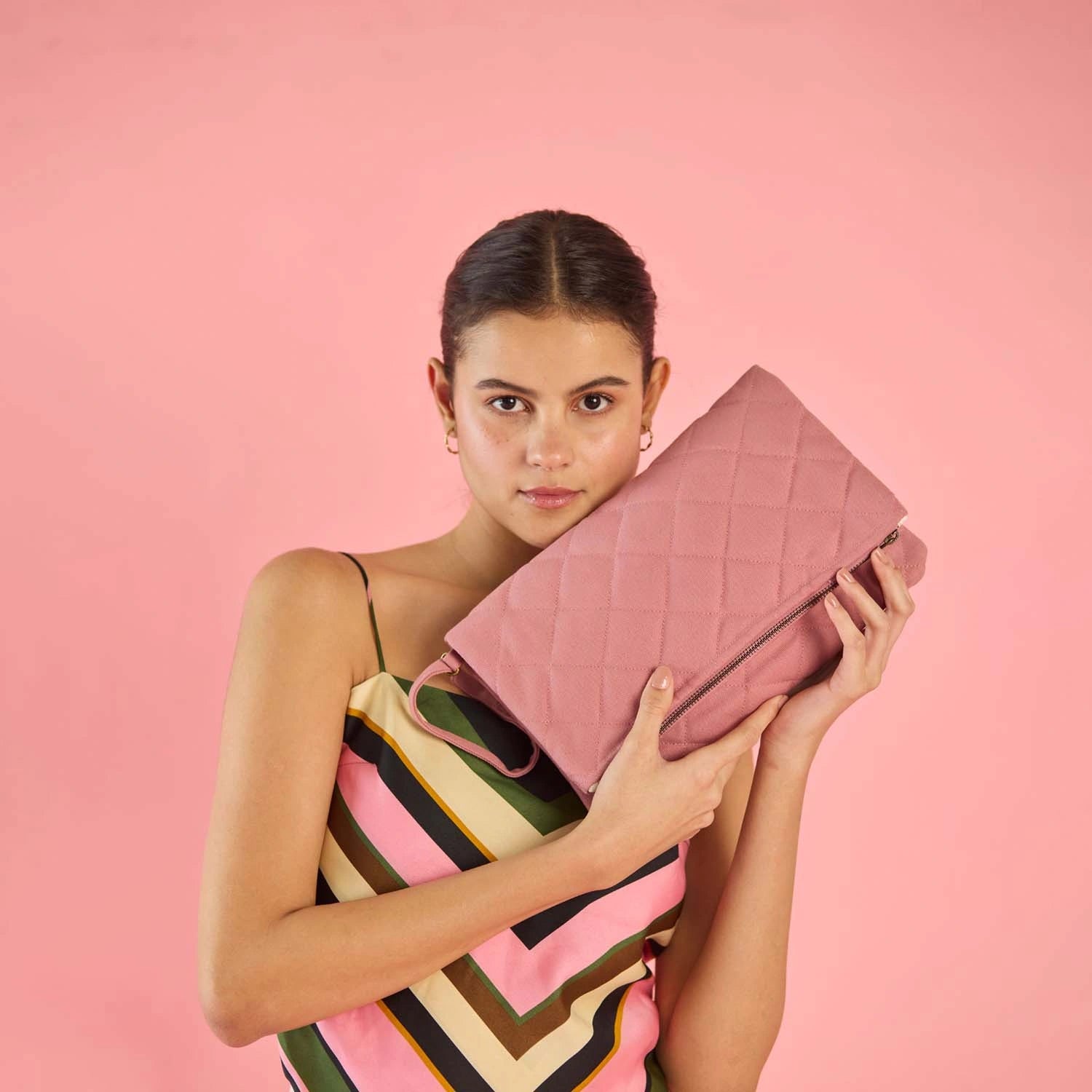 Discover every silhouette of our Krista Foldable Quilted partywear purse online