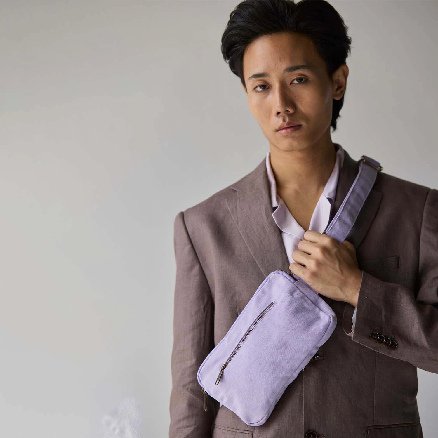 a sleek, durable, our J Banana waist pack bag in lilac