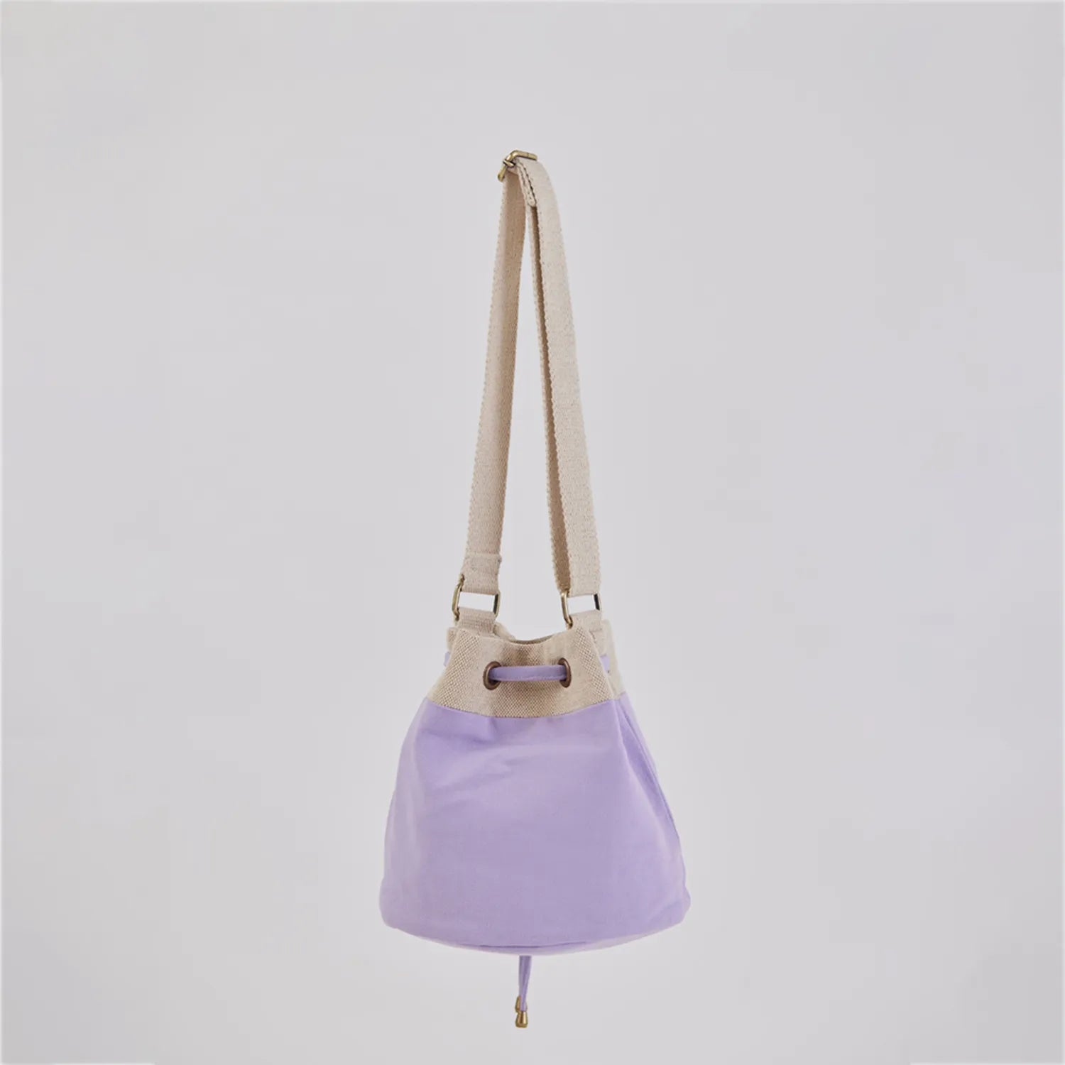 Ria Bucket Bag designed for a chic minimalist look with a comfortable adjustable strap