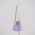 Stylish Ria Bucket Bag with a drawstring closure and spacious interior for your essentials