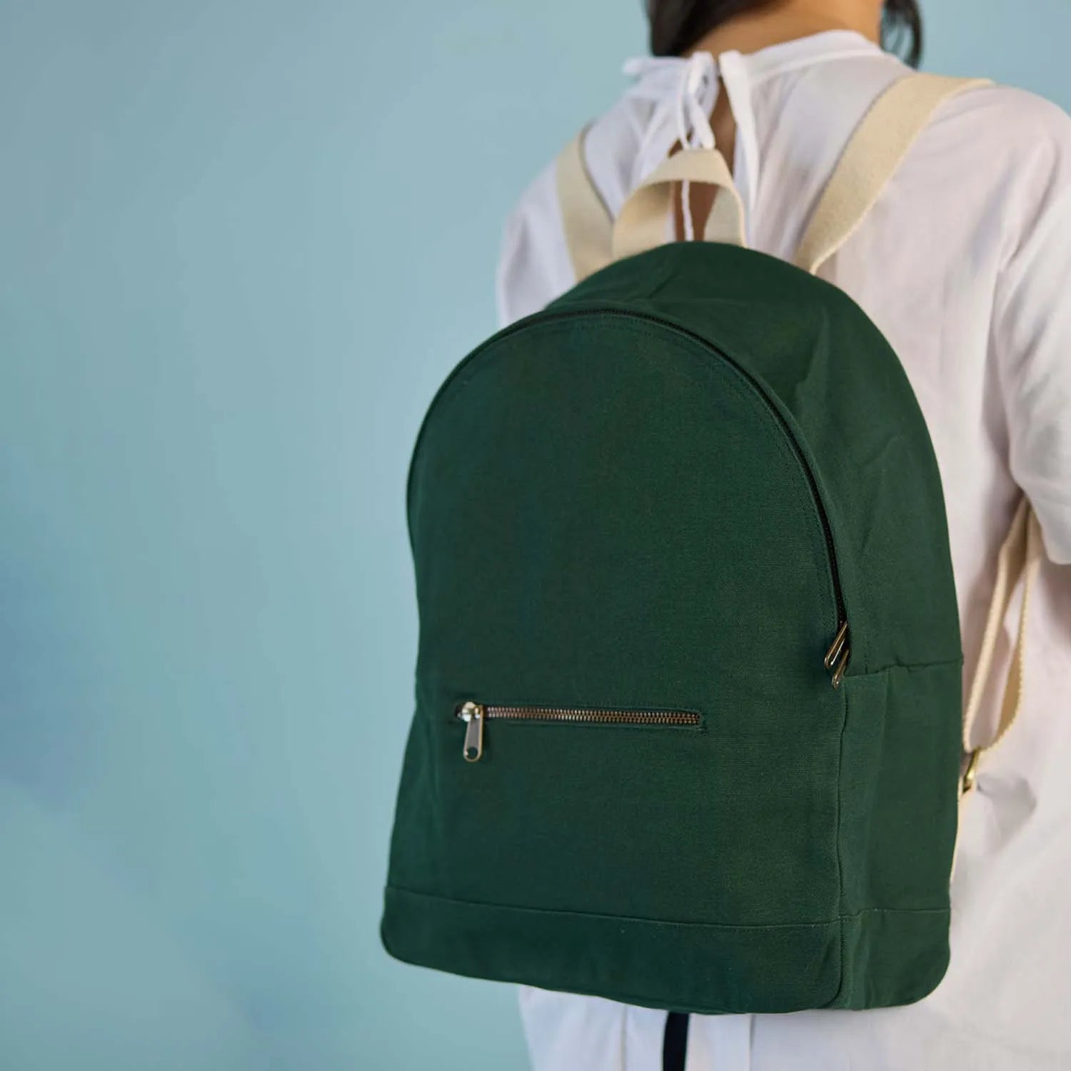 The Lucas Backpack worn as a backpack on a model