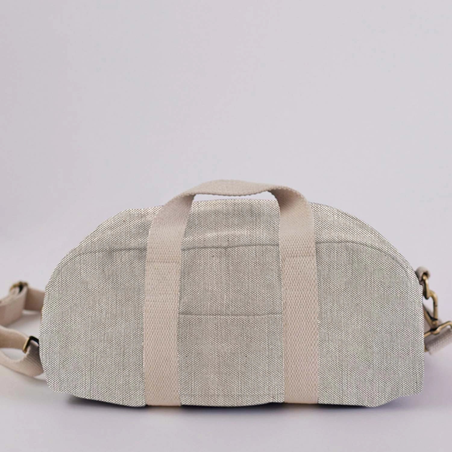 The mini Baba Bowler Bag in a soft, available in natural color.