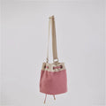 Ria Bucket Bag with a spacious interior and printed lining for a unique touch