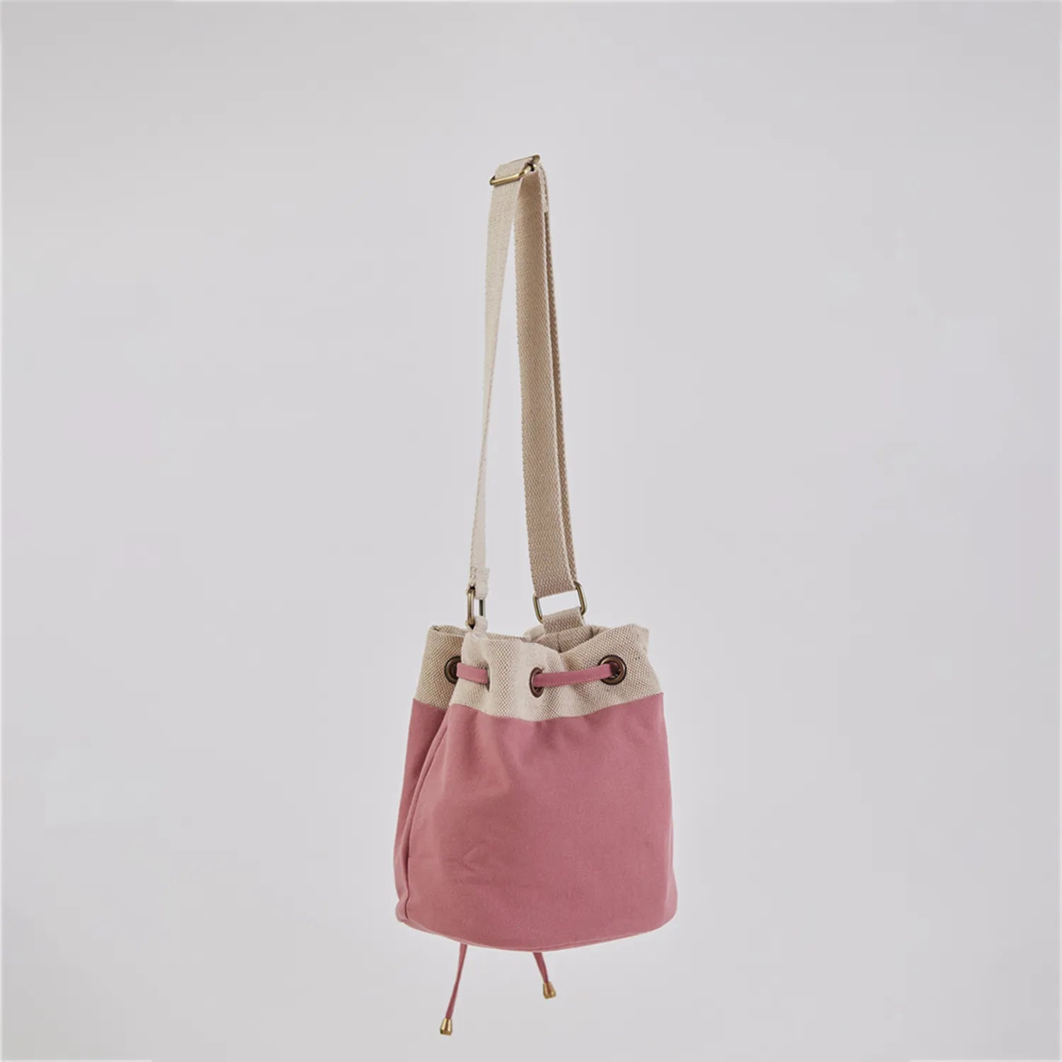Ria Bucket Bag with a spacious interior and printed lining for a unique touch