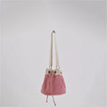 Ria Bucket Bag with a spacious interior and printed lining for a unique touch
