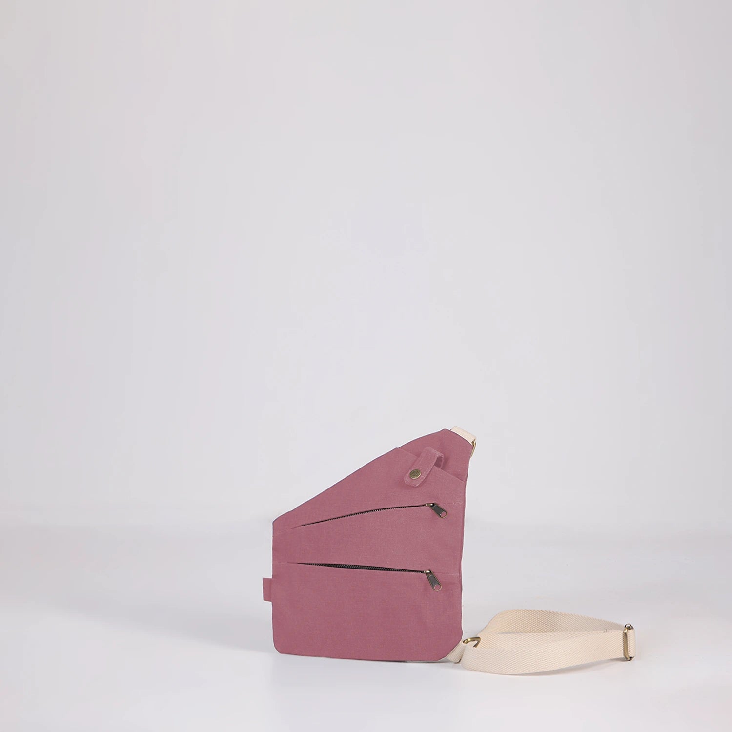 Pastel Pink Macho crossbody sling bag, designed to provide hands free comfort