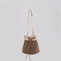 Ria Bucket Bag with a stylish crossbody strap and drawstring closure for easy access