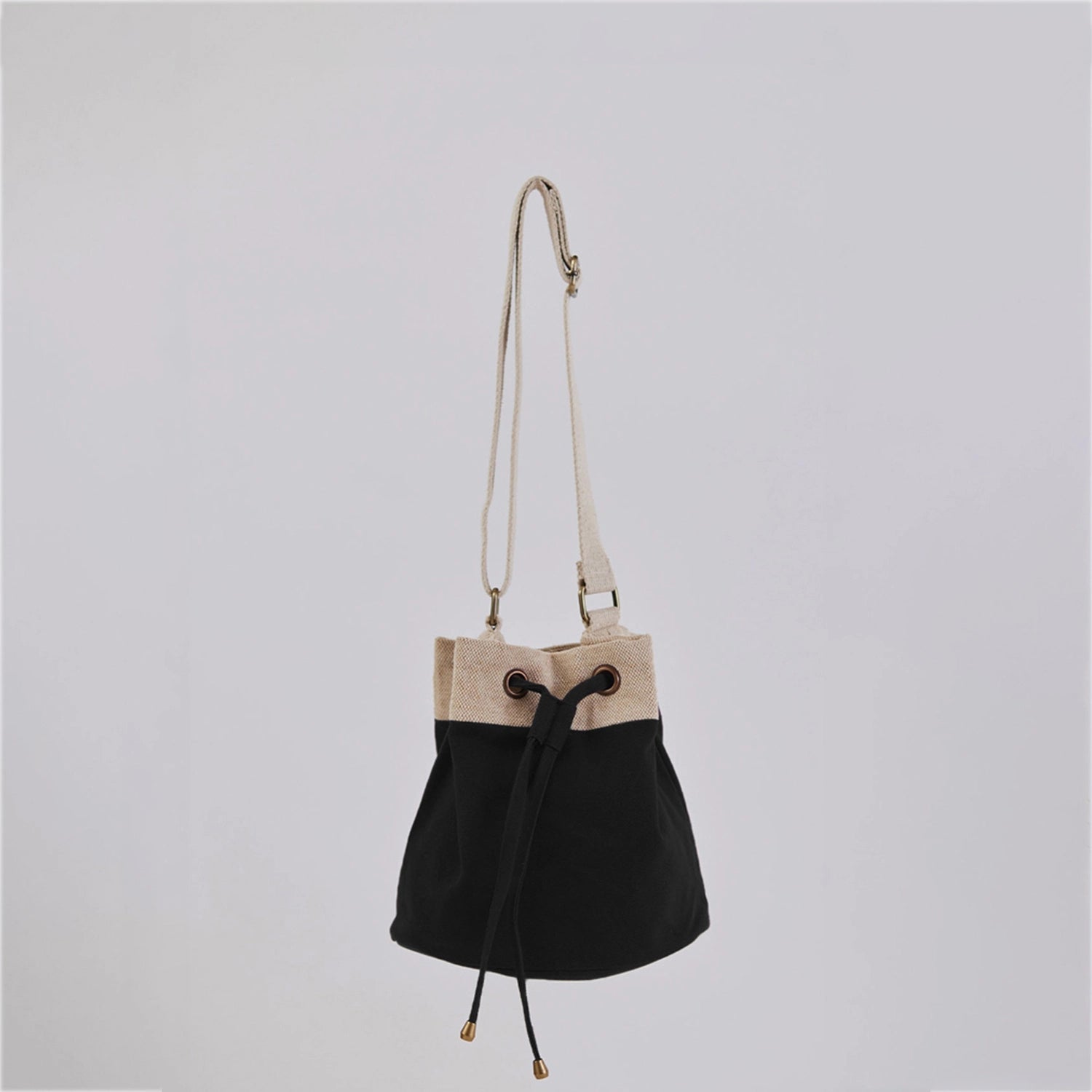 Ria Bucket Bag in soft cotton canvas with traditional prints on the interior lining