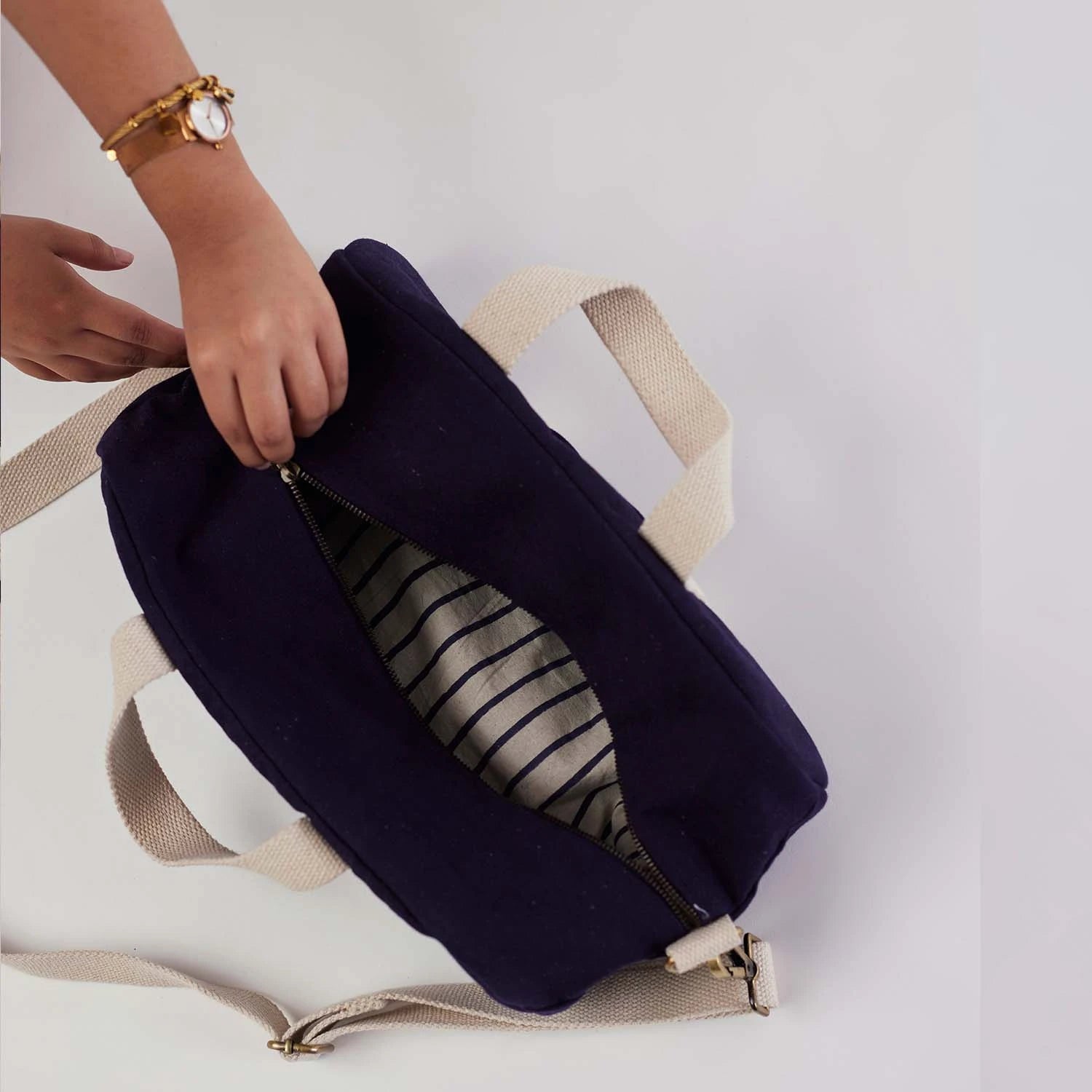 Dog D Originals Baba Bowler Bag with adjustable strap.