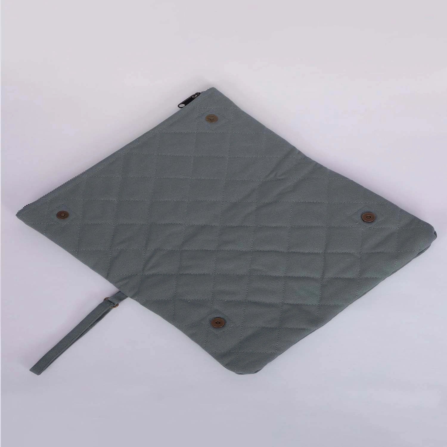 Enhancing your style, our Krista foldable quilted green clutch bag