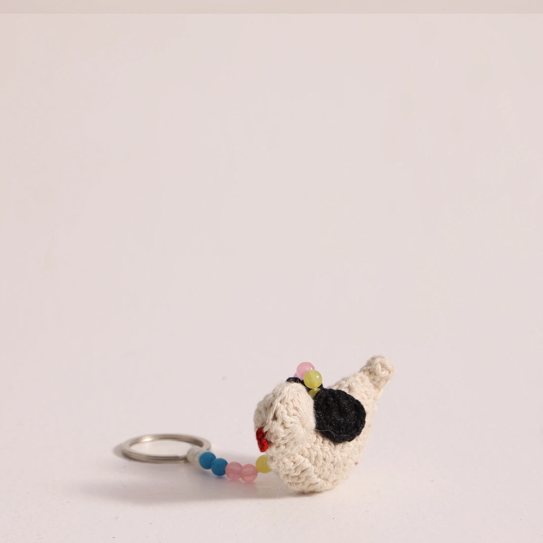 Crafted with care our bird keychain made up from cotton