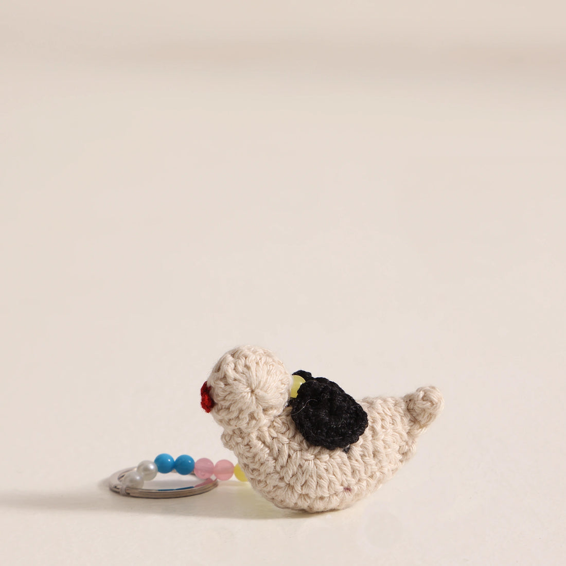 Crafted with care our bird keychain made up from cotton