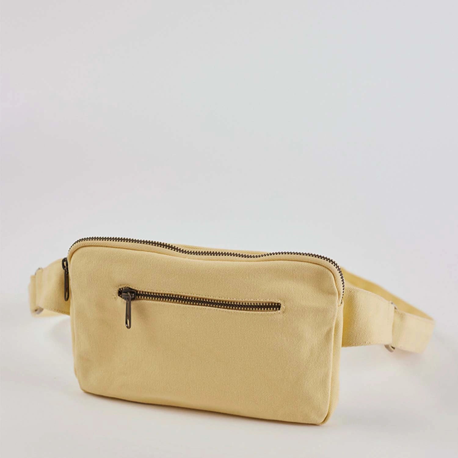 fashionable and stylish, our J banana belt bag available online in Pastel Yellow