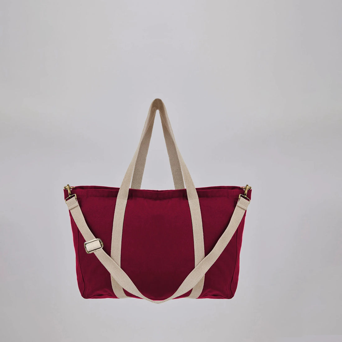 Trendy Sun J Bag in pastel pink with a printed inner lining and adjustable strap for comfort
