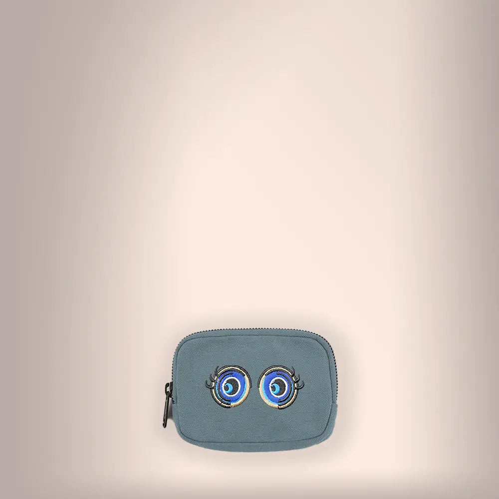 Keep your coins in style with the Cutie Eyes Athiya Coin Purse by DOG D Originals. 
