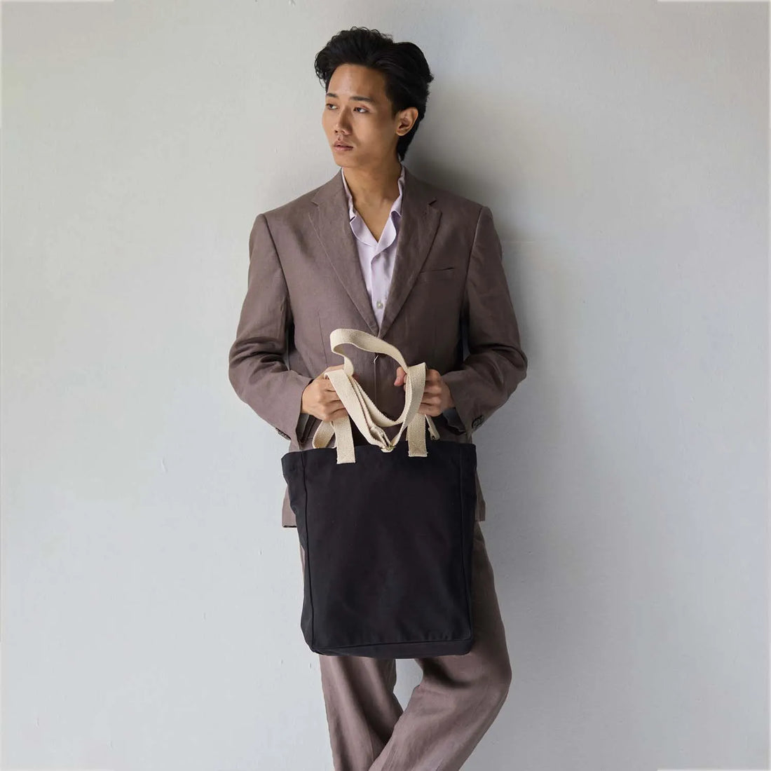 Organic cotton canvas tote with adjustable crossbody strap
