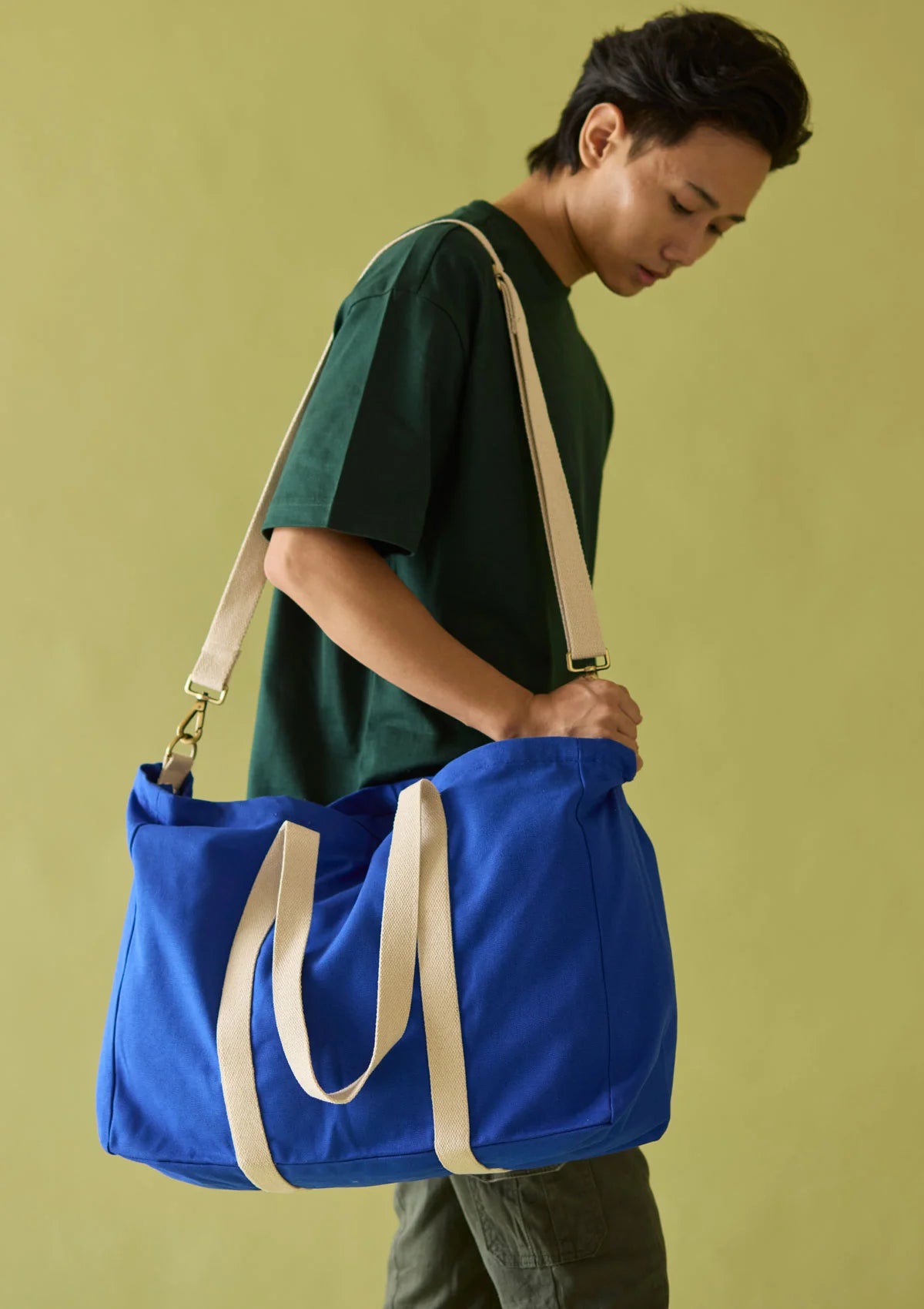 "Person using the Sun J Bag Large while enjoying a day at the beach."
