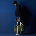 Sun J Bag Large in crimson with a crossbody strap for easy carrying on the go
