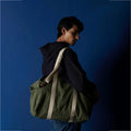 Sun J Bag Large in bottle green with skin-friendly metal adjusters and secure zippers
