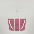 Sun J Bag Medium featuring an adjustable strap for a customized fit