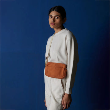 Madrid Crossbody Bag with hand block-printed interior lining and a sleek minimalist exterior
