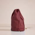 Wine Dil-jeet Convertible duffle handbag are sleek and stylish